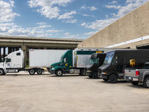 Exterior loading docks with trucks prepared for outbound work