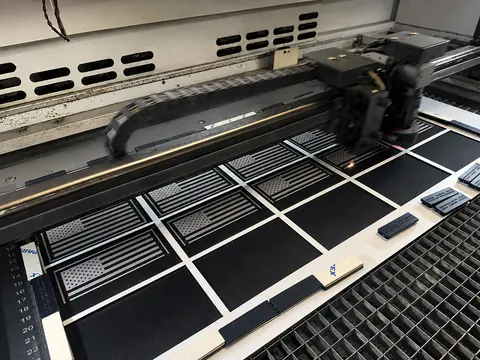 Laser cutting equipment producing a grid of apparel patches