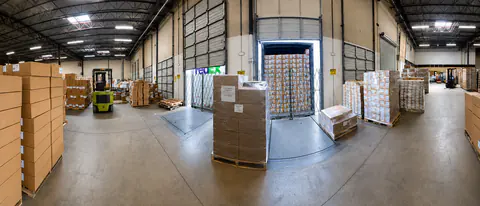 Palletized orders staged inside an active loading area