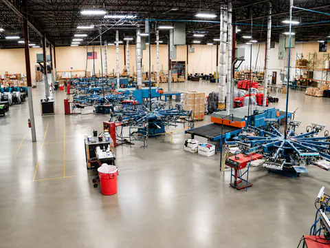 Wide view of the Impress Designs screen-printing department