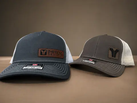 Group of caps finished with coordinated leather patches