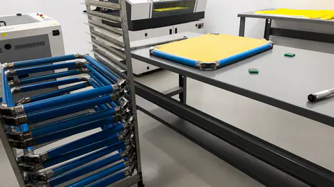 Art and prepress area with screen exposure equipment