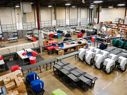 Wide overhead view of the Impress Designs embroidery department